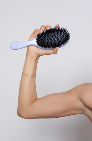 Smoothing Brush creating sleek, shiny hair finish