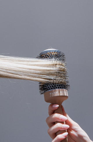 Glow Beauty Round Brush creating volume in hair