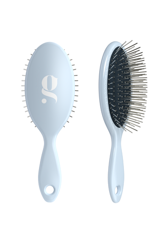 Glow Beauty Mini Detangling Brush — compact on-the-go size