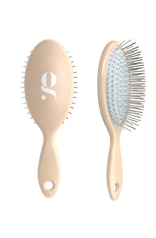 Glow Beauty Mini Detangling Brush — compact on-the-go size