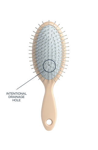 Glow Beauty Mini Detangling Brush — drainage hole and keychain clip