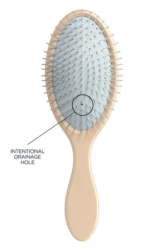 The Detangling Brush in cream and blue, front view